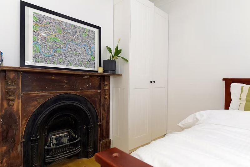 Bedroom with period fireplace