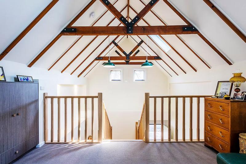 Exposed beams on inside of garage roof