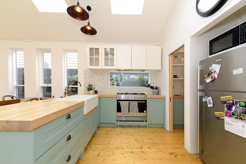 Fitted kitchen in light blue