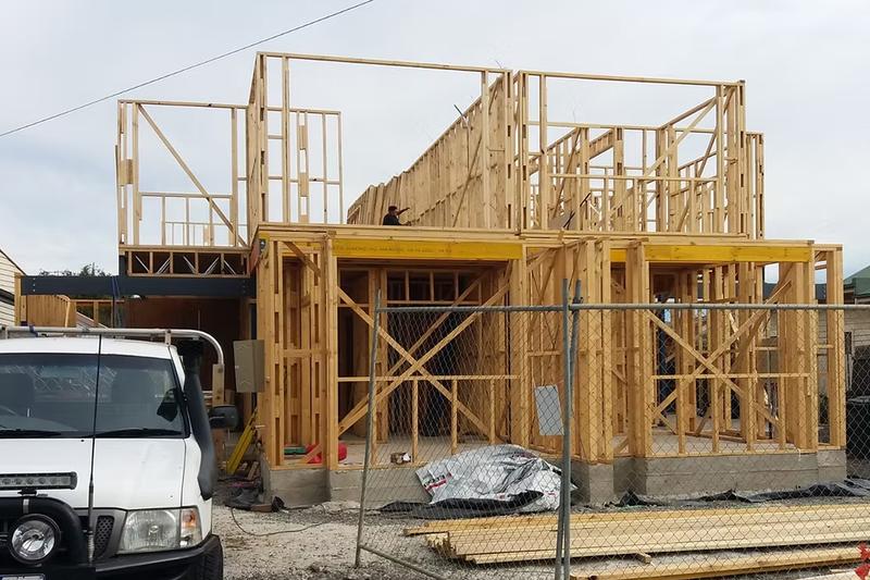 Duplex building frame under construction
