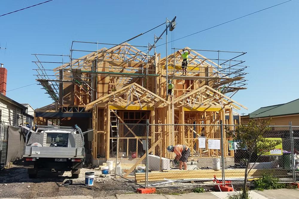 Duplex building replacing knockdown